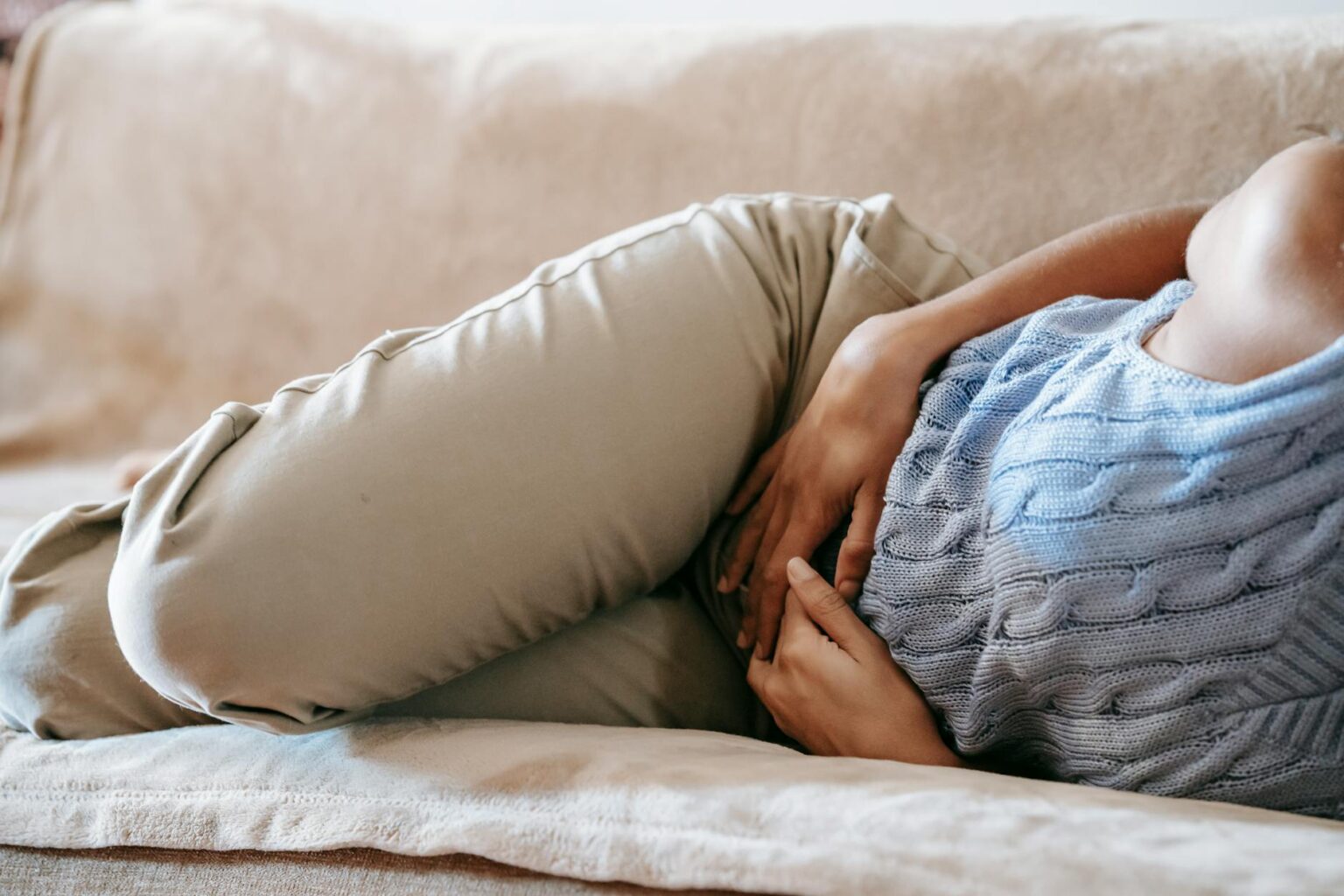 person suffering from a stomach pain